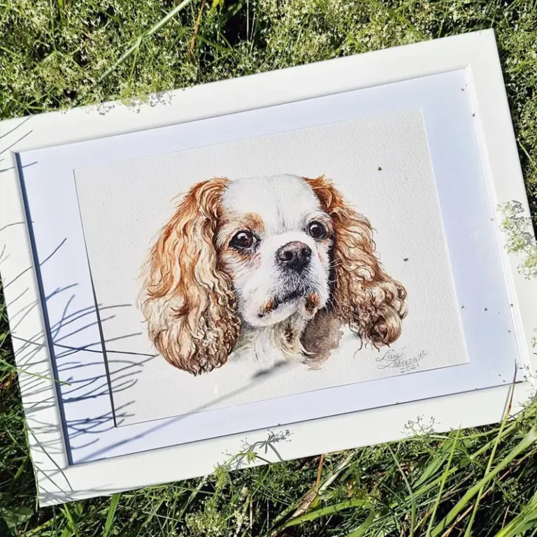 framed king charles spaniel portrait